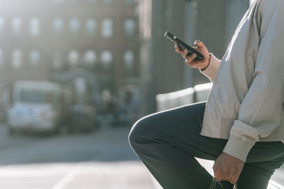 Image depicting citizen journalism in action, with a person capturing an incident using their smartphone