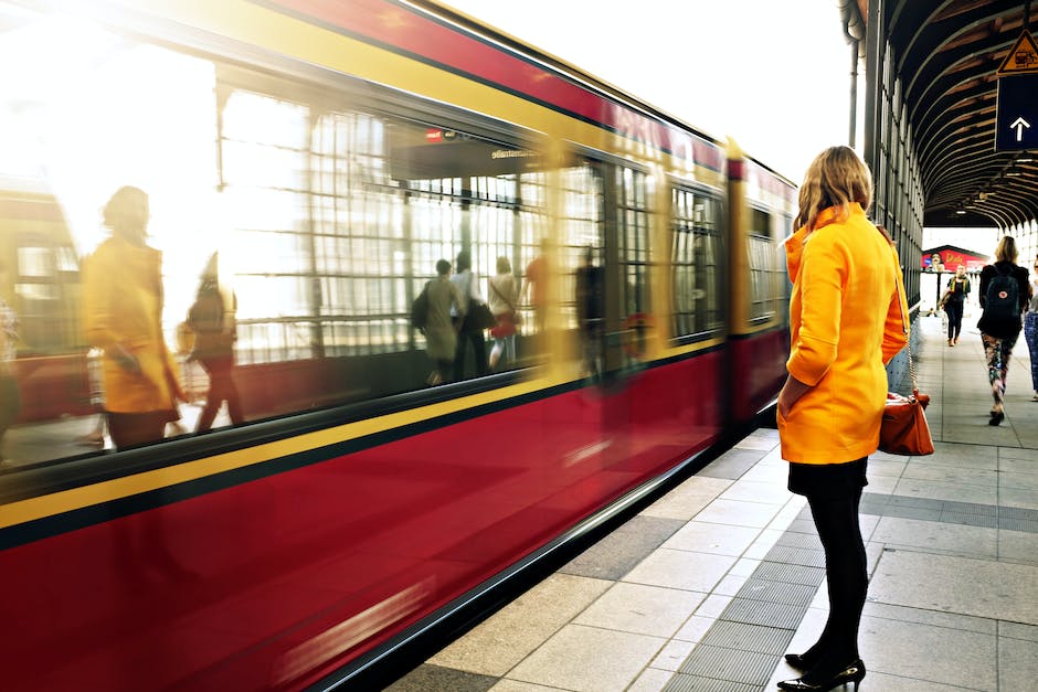 Image depicting the stress and frustration of commuting, with crowded public transportation and congested highways