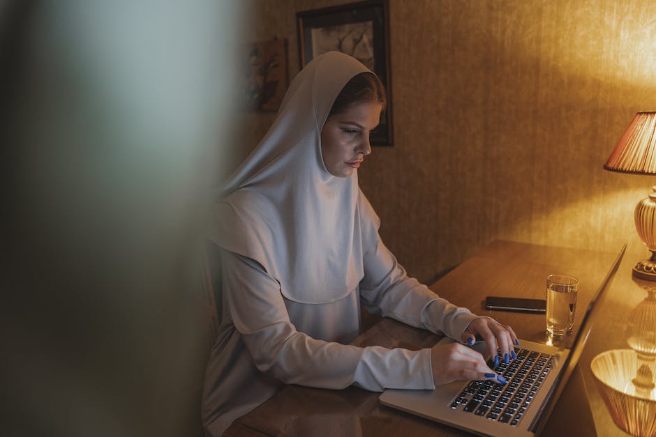 A vibrant image of a person holding a laptop with a glowing brain, representing continuous learning and adaptation in software engineering.