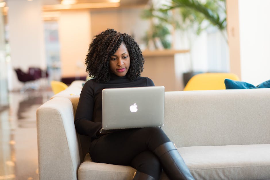 An image showing a person browsing the SHEIN website on a laptop