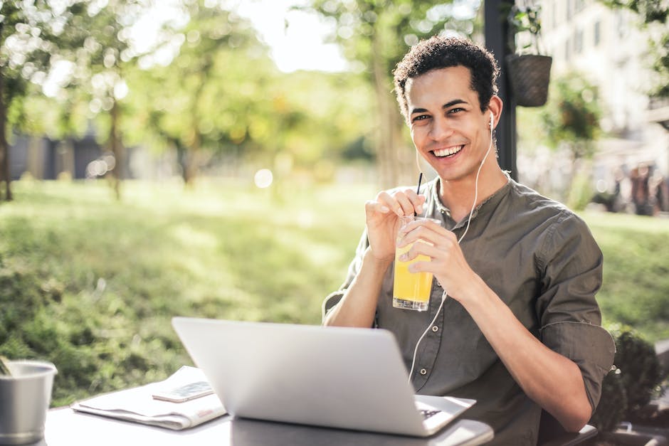 An image of a person holding a magnifying glass, symbolizing the assessment of one's own worth within a company